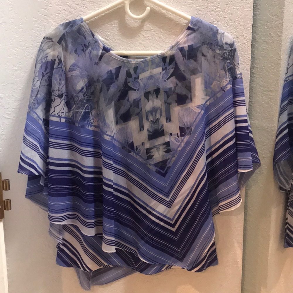 Sleeveless tank with bat wing overlay